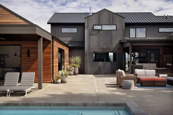 Open Floor Plan Home Featuring a Natural Palette of Steel, Concrete and Walnut 3