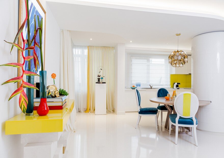 Urban Classy Home Designed by HNK in Plenty of White and Vivid Colors