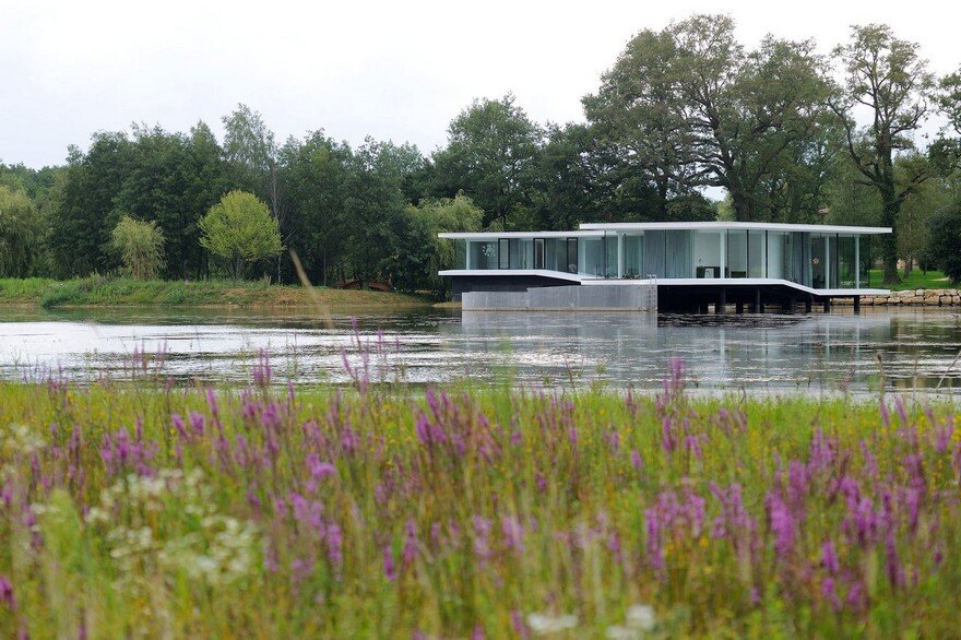 Concrete and Glass Residence Built on the Surface of a Lake: White Snake House