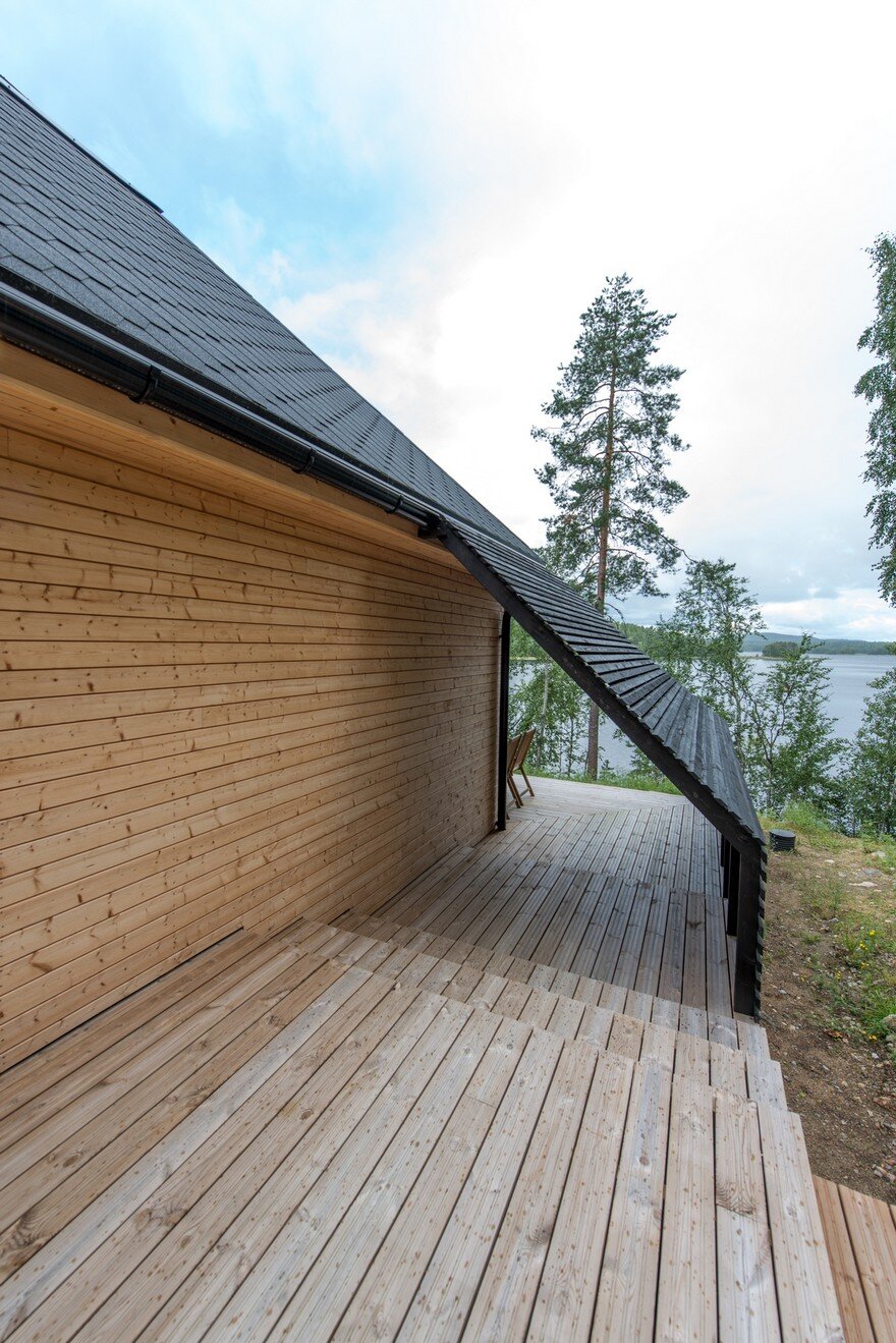 A Finnish Retreat Features a Pyramidal Roof and a Glass Wall Facade 14