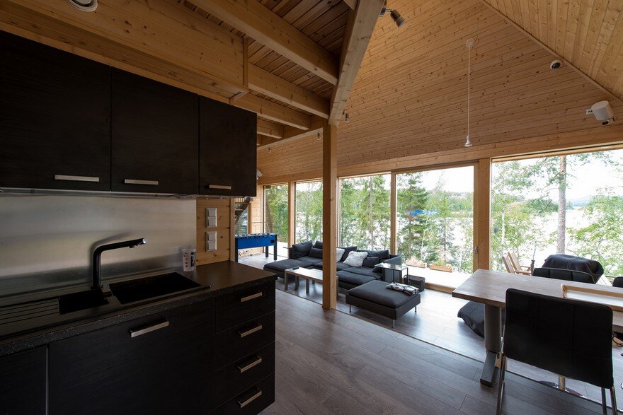 A Finnish Retreat Features a Pyramidal Roof and a Glass Wall Facade 4