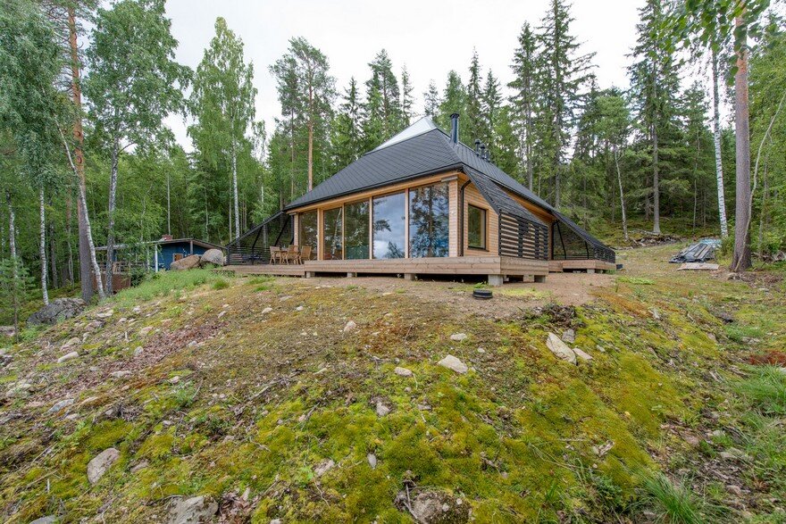 A Finnish Retreat Features a Pyramidal Roof and a Glass Wall Facade 15