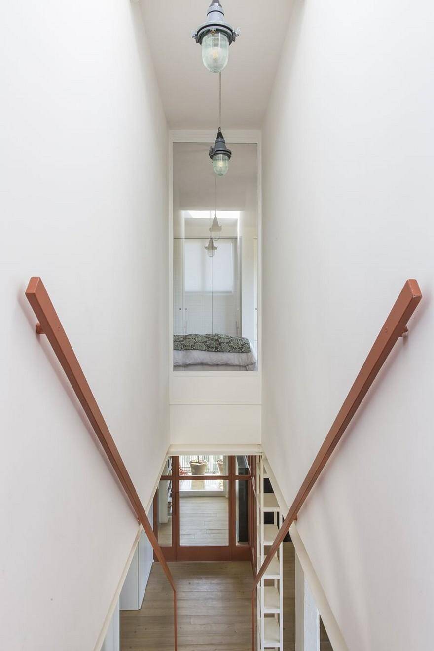 Two-Storey Family Apartment in Rome Exhibiting a Powerful Character 7