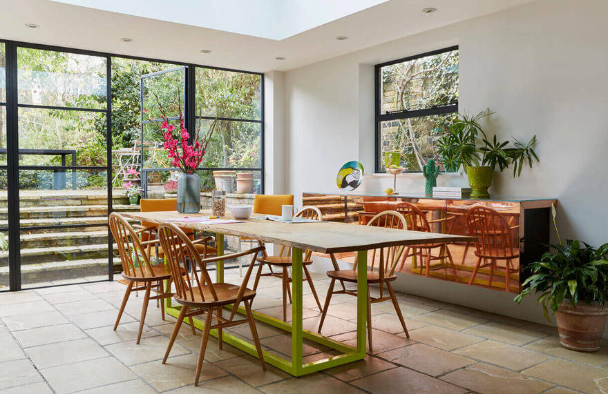 Georgian Terraced House Gets Delicate Restoration with Retro 70s Glamor, dinning room