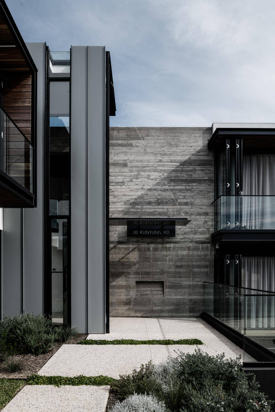 Two Angle House Featuring Provocative Architecture Using Concrete, Stone and Wood 5