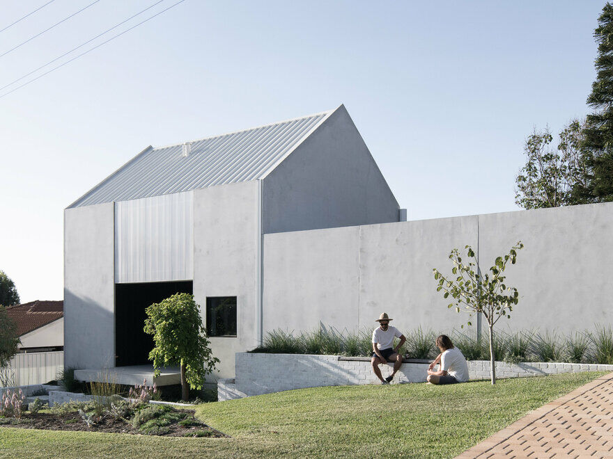 Carbon Neutral House Made from Concrete Panels and Whitewashed Recycled Brick 12