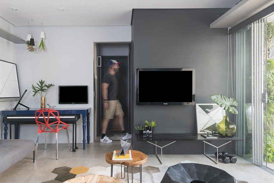 Compartmentalized Apartment Converted into a Completely Integrated Living Space 6