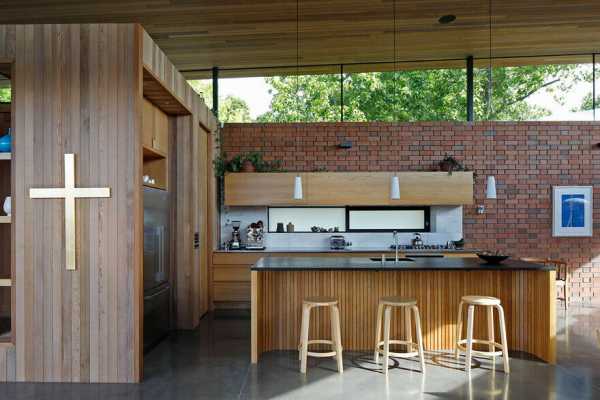 Walled Courtyard House Organised Around a Central Pool 4