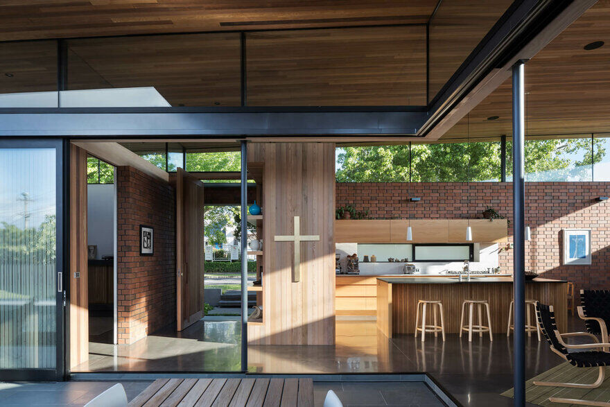 Walled Courtyard House Organised Around a Central Pool 3
