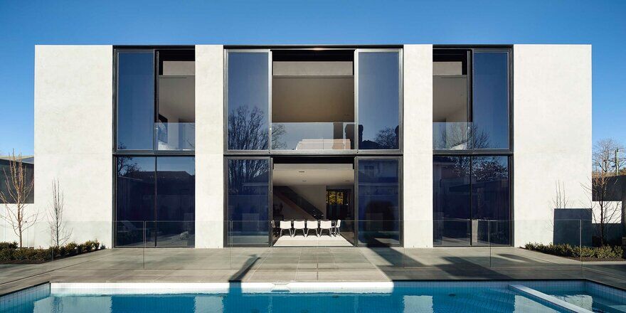 Teringa House in Toorak Featuring a Fluid Concrete Façade with Cascading Tinted Glass