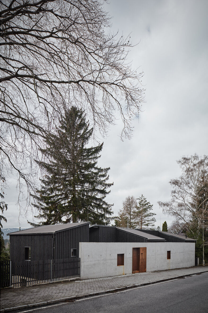 Nordic Esthetics with a Touch of Industrial Style / House Behind The Wall