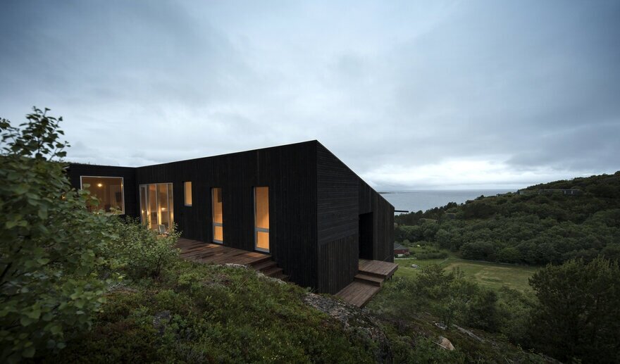 A Wooden Hillside Cabin by Kappland Arkitekter on the Island of Stokkøya, Norway