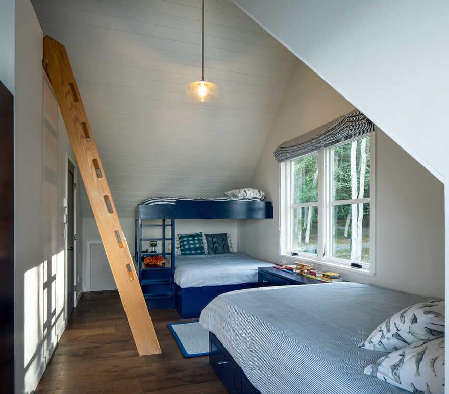 bedroom, a Renovated Waterfront Retreat by Heliotrope Architects