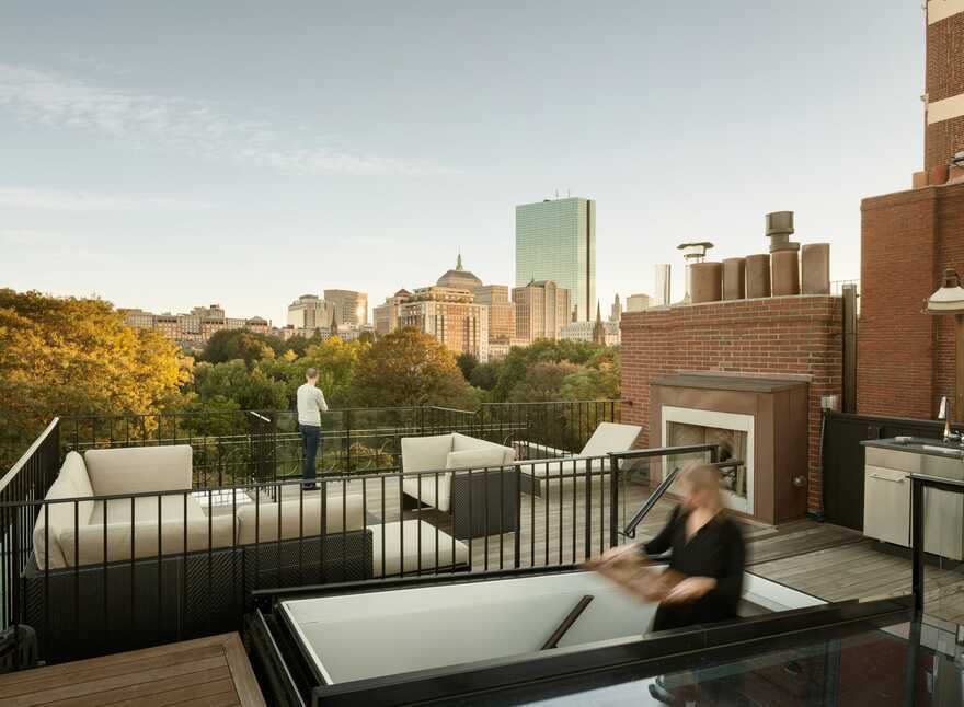 roof terrace by Hacin + Associates