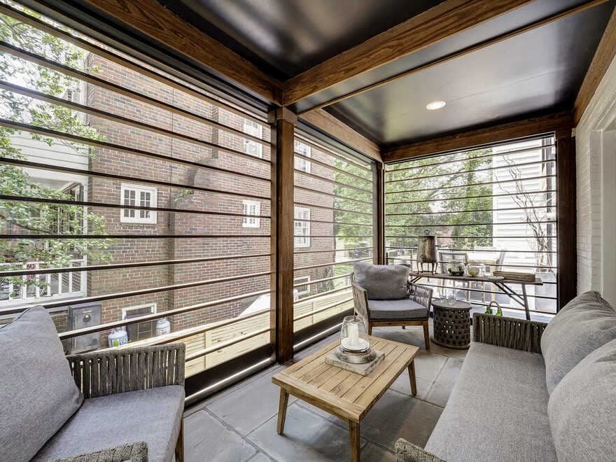 Chevy Chase House, a Butterfly Roof & Cascading Wood Siding Transforms This Home in DC