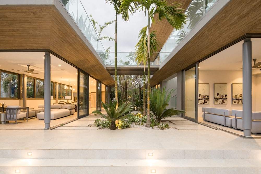 Andaluz Courtyard House Featuring Contemporary Tropical Design