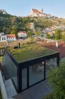 Family House on the Waterfront with a Green Roof / Kuba & Pilař Architekti