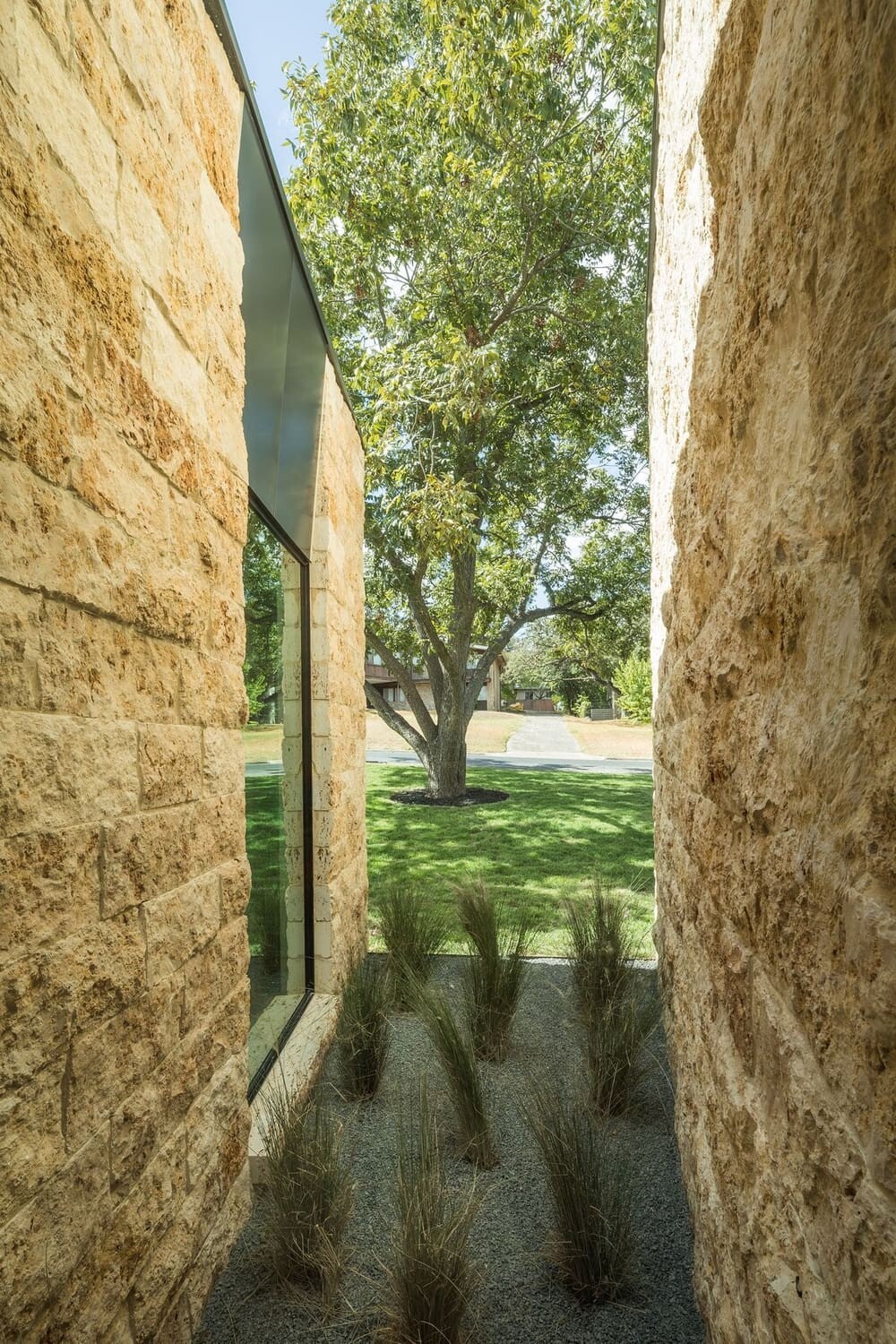Modern House in Austin Designed as a Grouping of Small Intimate Stone Pavilions