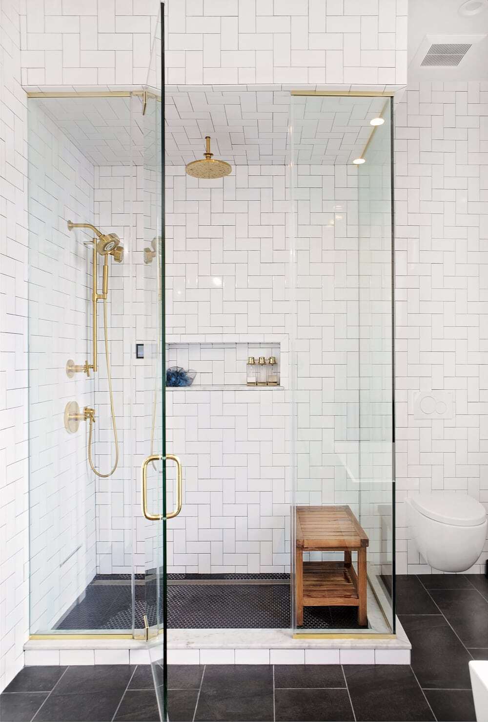 Kohler brushed gold shower set and steam shower.