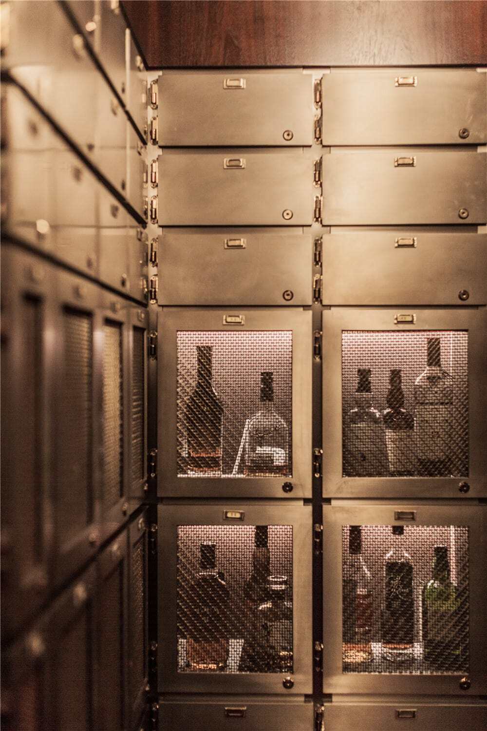 The wines from patrons stored at stainless steel compartments.