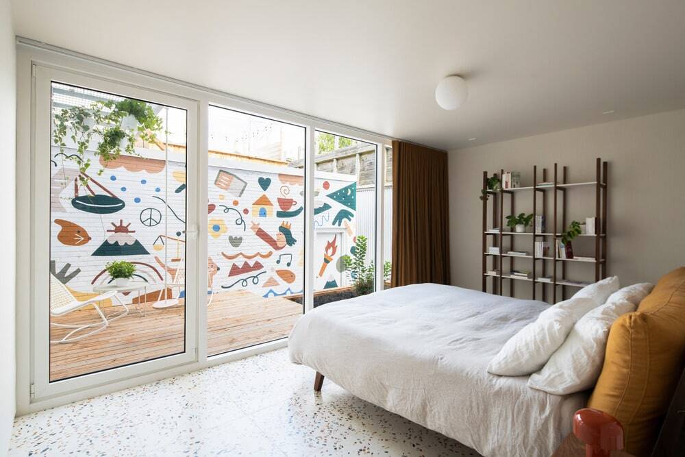 Master bedroom's view on inner courtyard with mural by Artist Marc-Olivier Lamothe