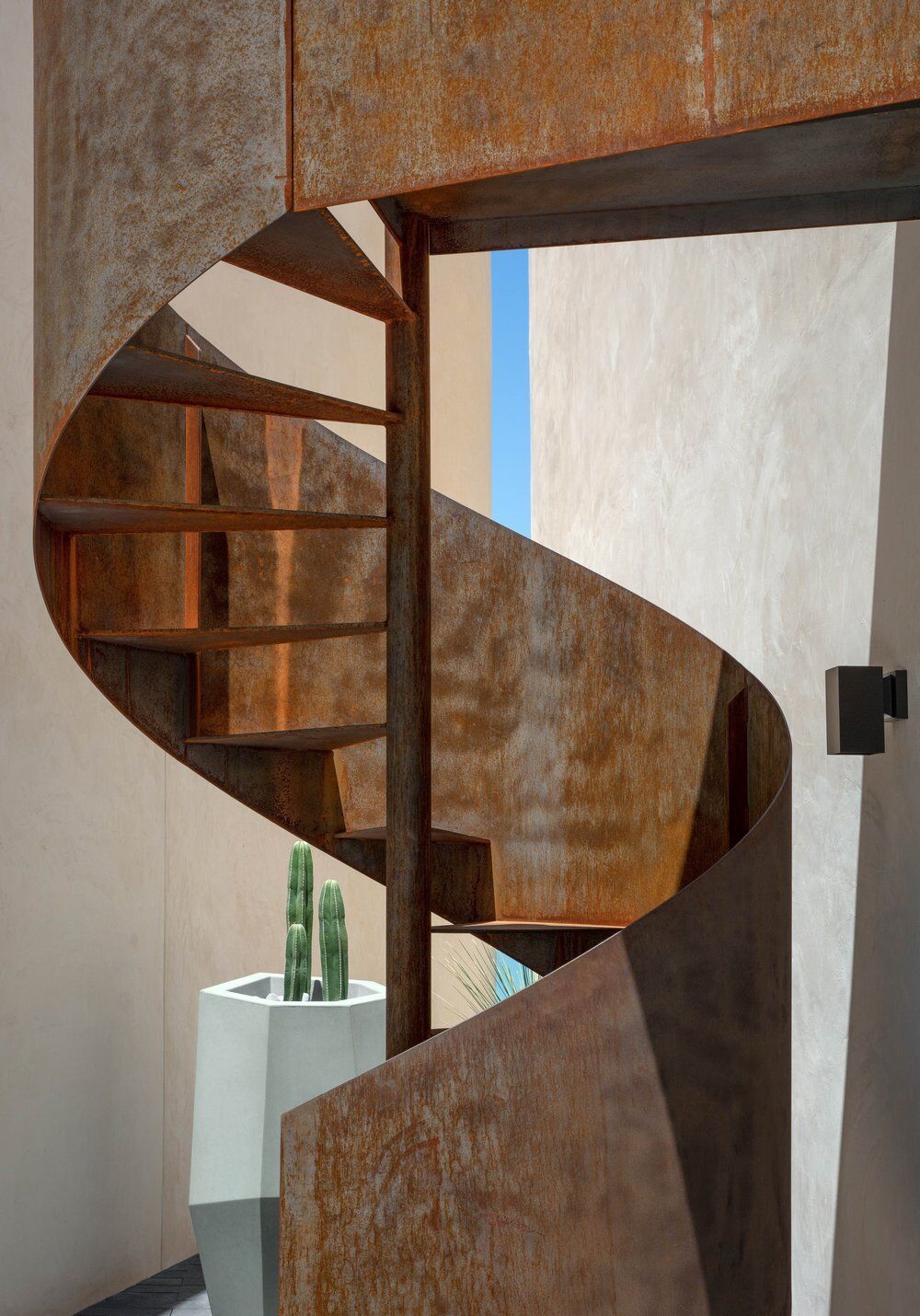 steel spiral staircase, Ibarra Rosano Design Architects