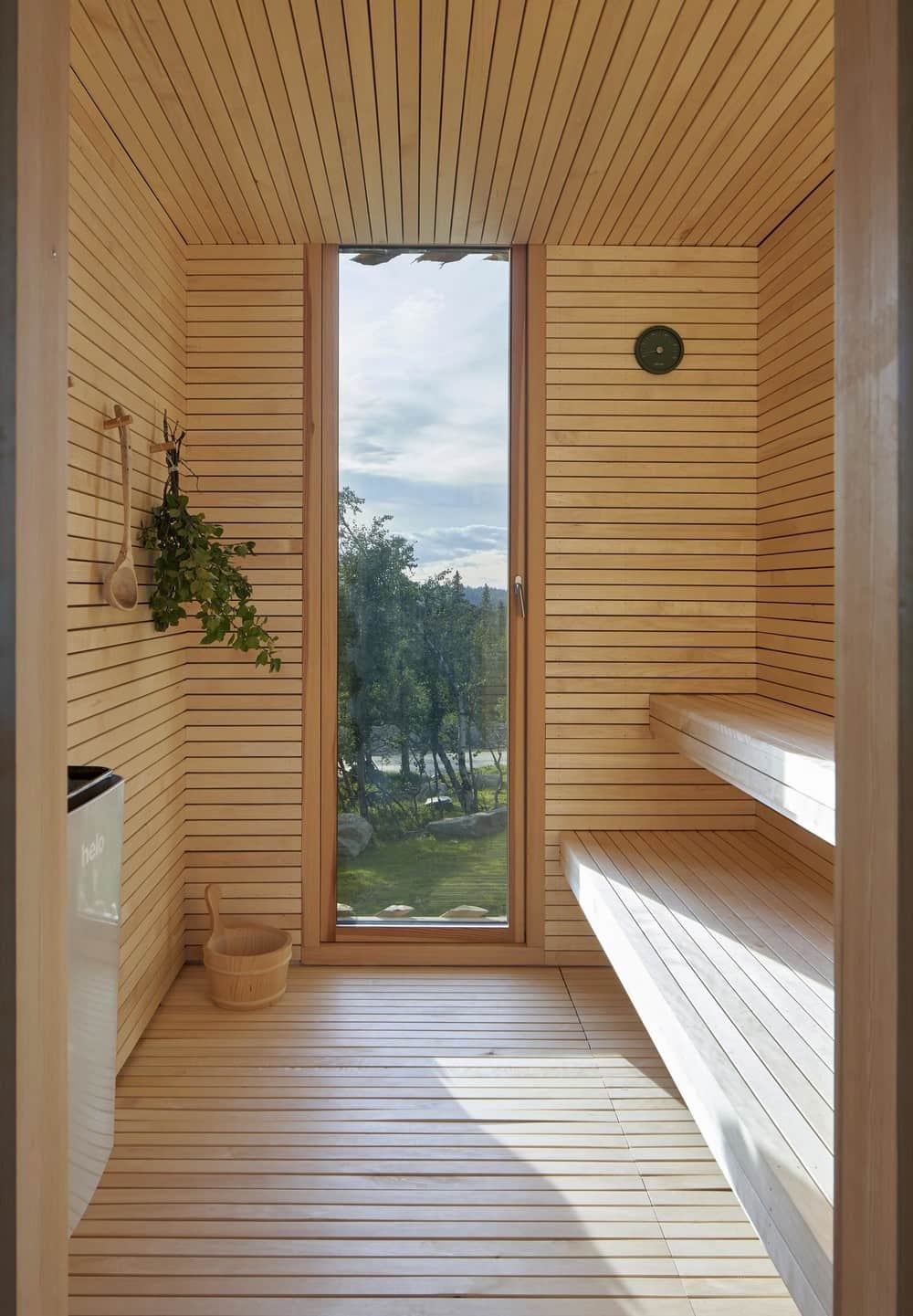 Skigard Hytte Cabin by Mork-Ulnes Architects