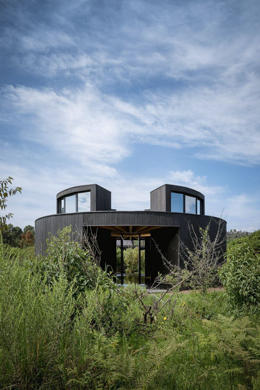 Net Zero House Equipped with a Green Roof and Sustainable Bathhouse