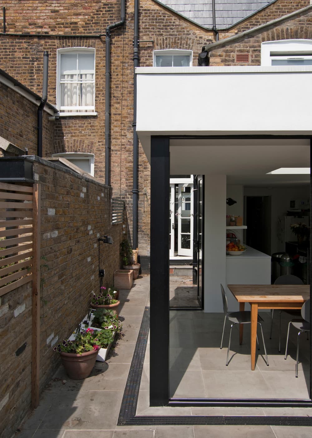 Three-Sided Glass Extension to a Victorian Terrace House in North London