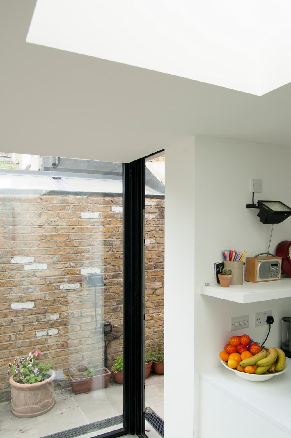 Three-Sided Glass Extension to a Victorian Terrace House in North London