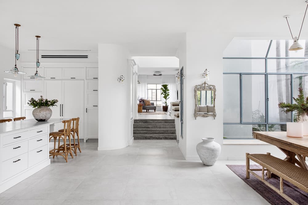 Israeli House Dominated by White Hues with Pastel Touches