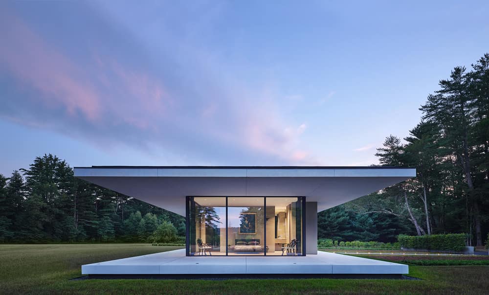 Minimalist Glass House Dots a 9 Acre Grass Field in Berkshires, MA