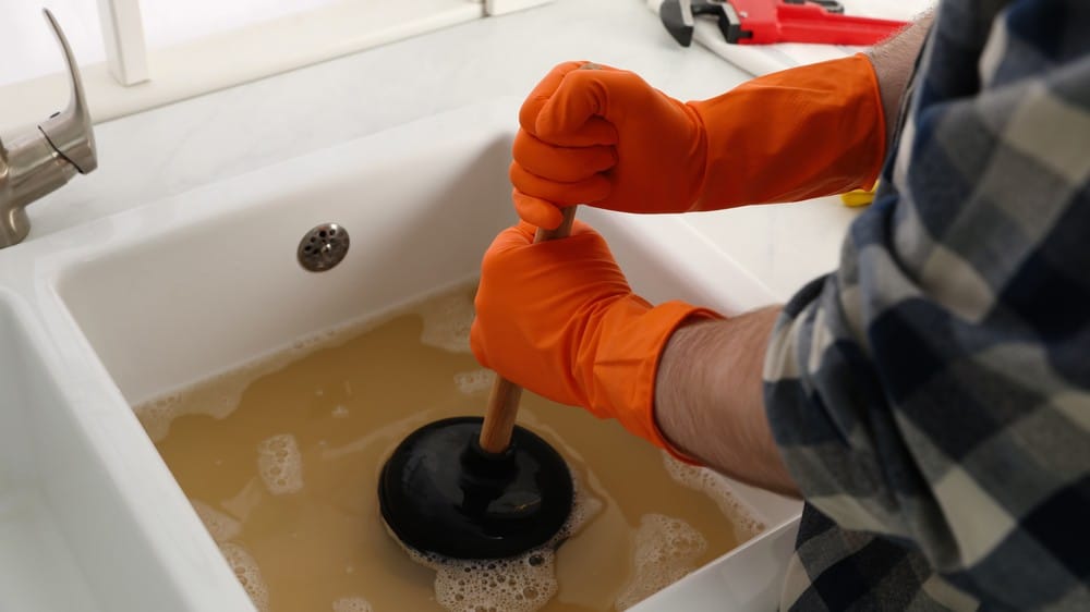 How to Unclog a Sink Drain With Baking Soda and Vinegar