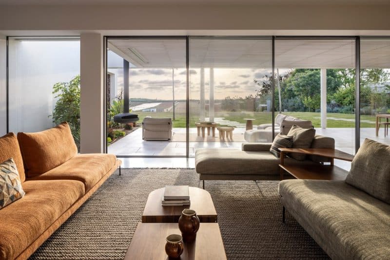 living room, Villa with Multiple Exits to Courtyards and Fields